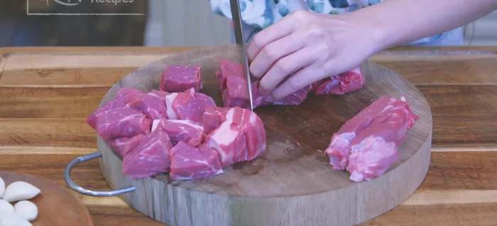 Cut beef into 1-inch cubes. Add to a stock pot, fill with water, and bring to a boil. Partially cover to prevent overflow.