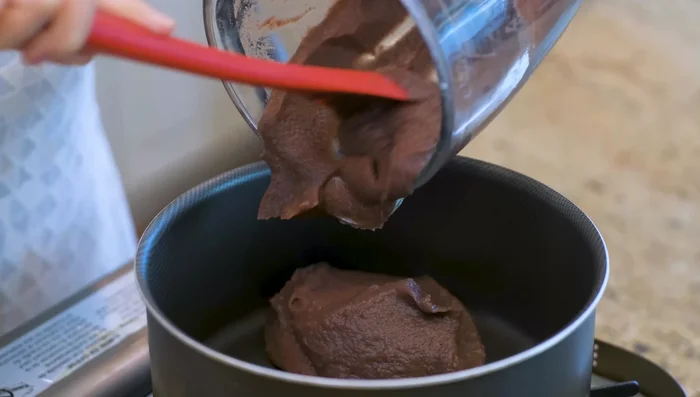 Transfer the blended mixture to a nonstick pot. Add salt, cooking oil, brown sugar, and lemon juice.