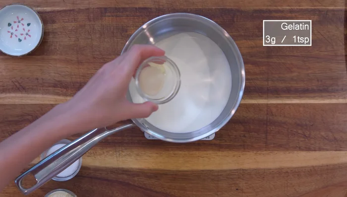 Prepare the lava filling: Combine butter, whipping cream, gelatin powder, sugar, milk powder, and cheese in a saucepan. Stir until melted.