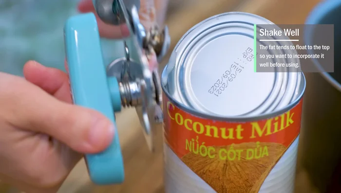 Add 200ml coconut milk (shake well), sugar, and cake flour (or all-purpose flour) to the pot. Stir with a silicone whisk. Sieve the mixture to remove lumps.