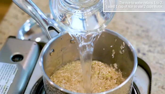 Stovetop Method: Use a 1:2 rice-to-water ratio (1 cup rice, 2 cups water). Bring to a simmer, then reduce heat to low, cover, and cook for 30 minutes (add 8 minutes per extra cup of rice).