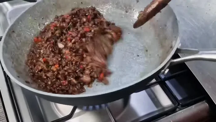 Stir in the chives (or spring onions).