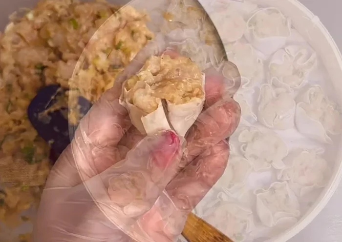 Arrange the dumplings in the steamer, cover, and steam for 10-12 minutes over boiling water.