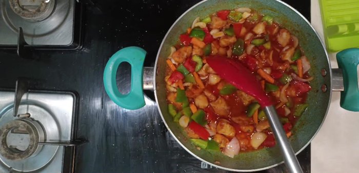 Add half a cup of water, cover, and let it cook for 5 minutes.