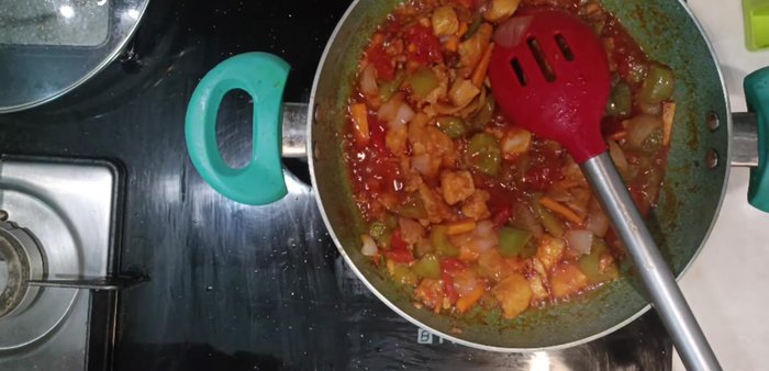 Make a slurry with corn flour and water. Add the slurry to the chicken and cook until the gravy thickens on low flame.