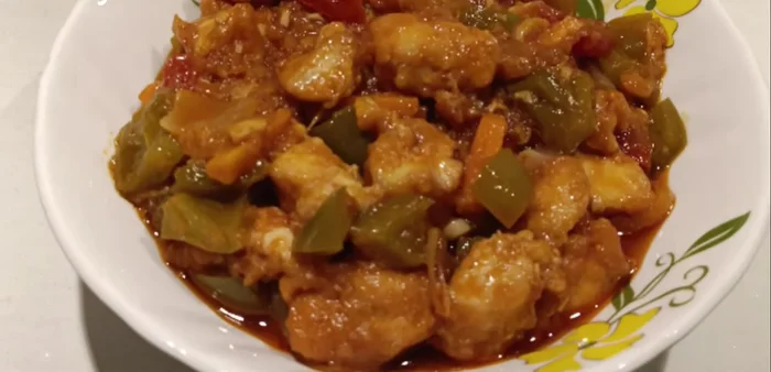 Serve hot with fried rice and noodles.