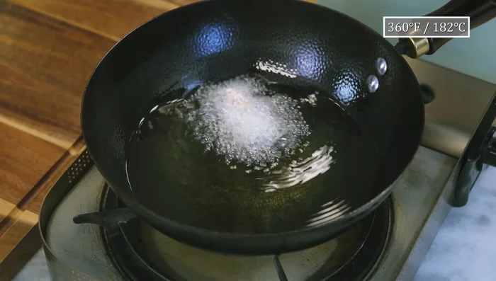 Heat oil to 360°F. Fry chicken for 3 minutes, stirring constantly. Remove and let rest for 10 minutes.