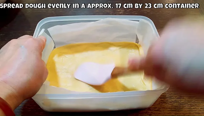 Chill both doughs: Spread the water dough into a rectangle in a 17cm x 23cm container and chill for 30 minutes.