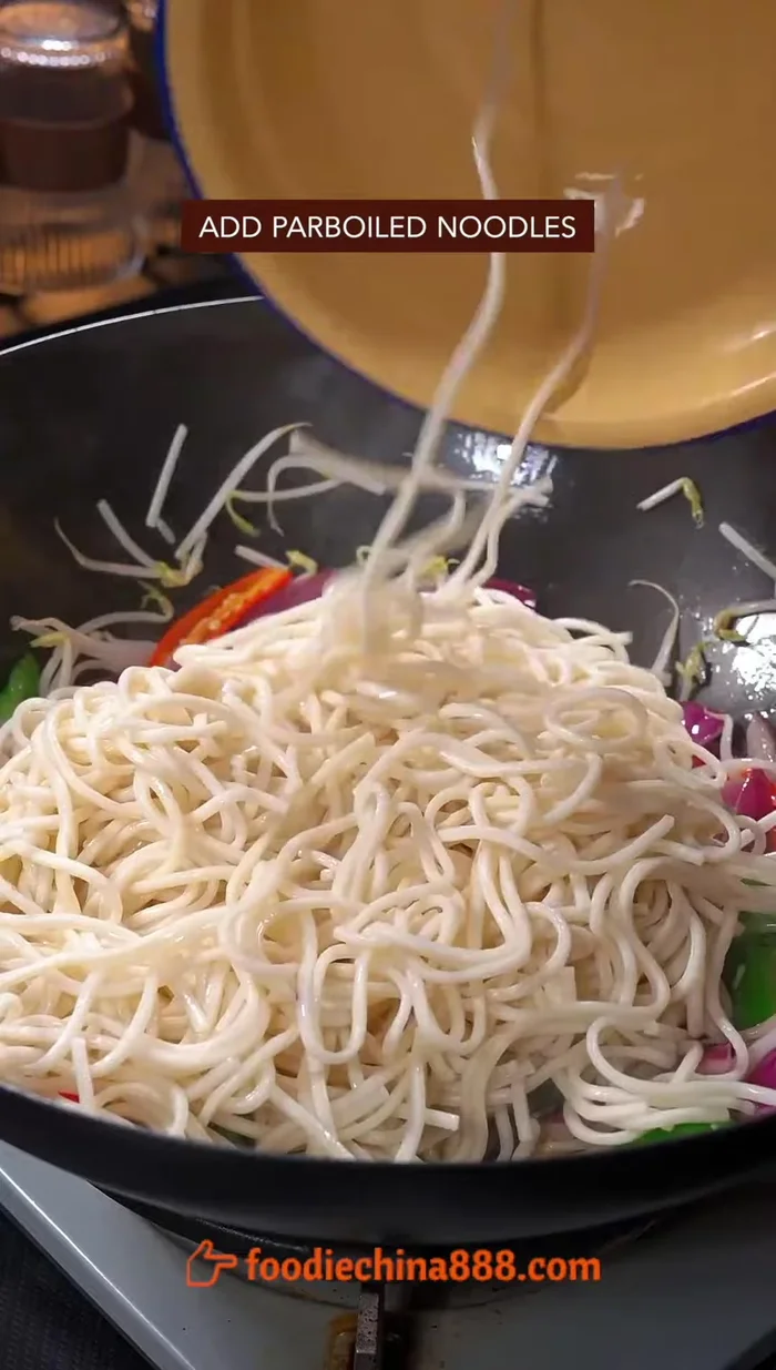 Add noodles and Chinese secret sauce.