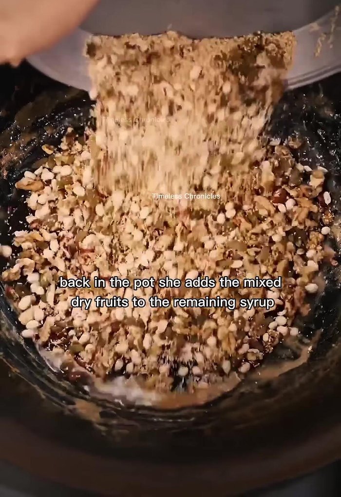 Add the mixed dry fruits to the remaining syrup and stir well.
