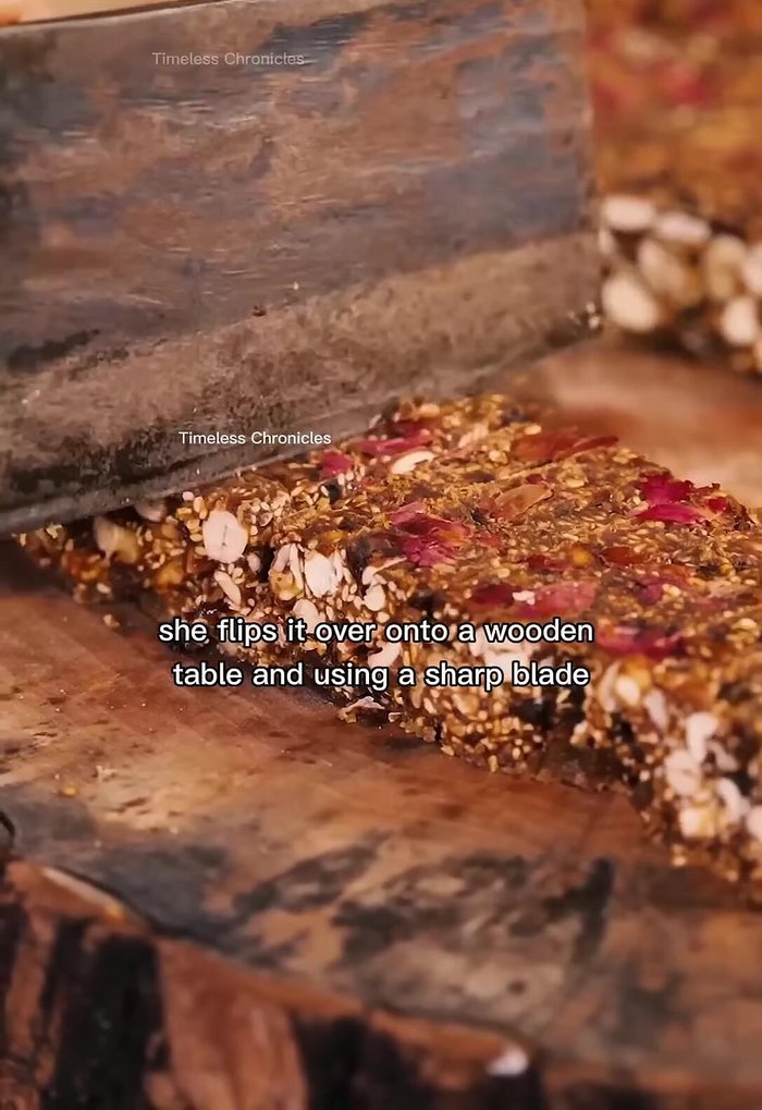 Flip the hardened mixture onto a wooden table and cut it into small pieces.