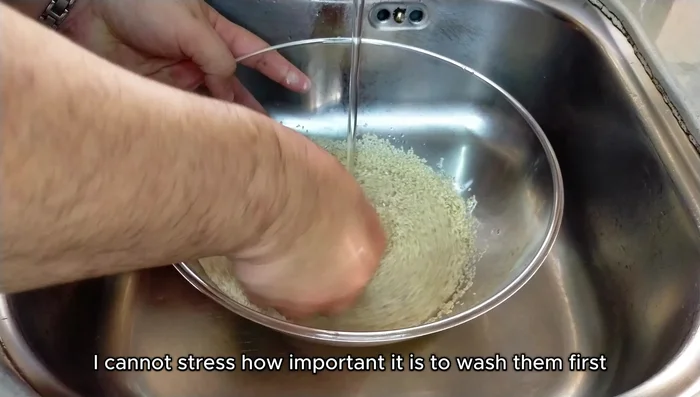Wash sesame seeds thoroughly to remove dirt and debris. Strain and let them sit for a few minutes to drain excess water.