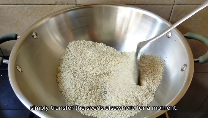 Toast sesame seeds until pale golden to golden brown (avoid burning!). Continue tossing for 5 minutes after removing from heat.