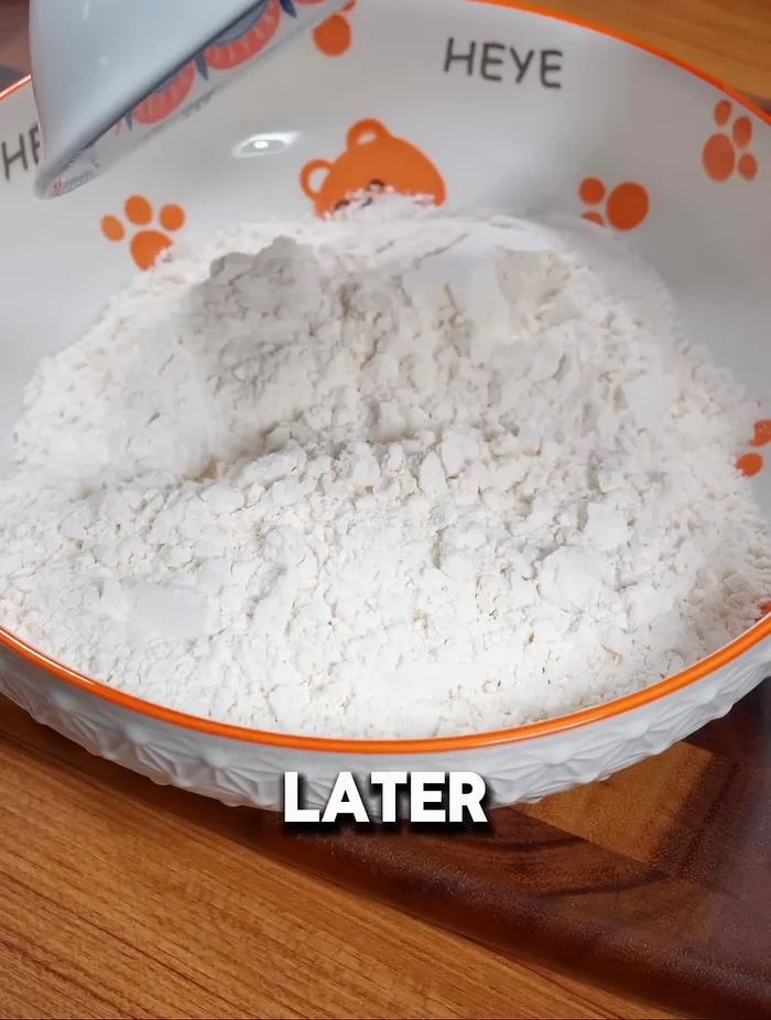 Add the egg mixture and 80g milk. Stir with chopsticks until you have dough lumps.