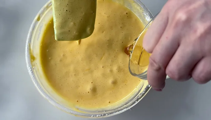Add oil and blend until smooth.