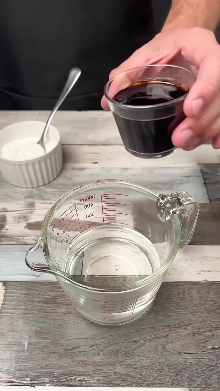 In a bowl, mix 1 cup of water, 1/2 cup of soy sauce, and 2 tbsp of cornstarch until dissolved.