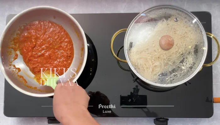 Add pepper powder and mix well until slightly thick and oil separates. Add optional tomato ketchup or Schezwan sauce.