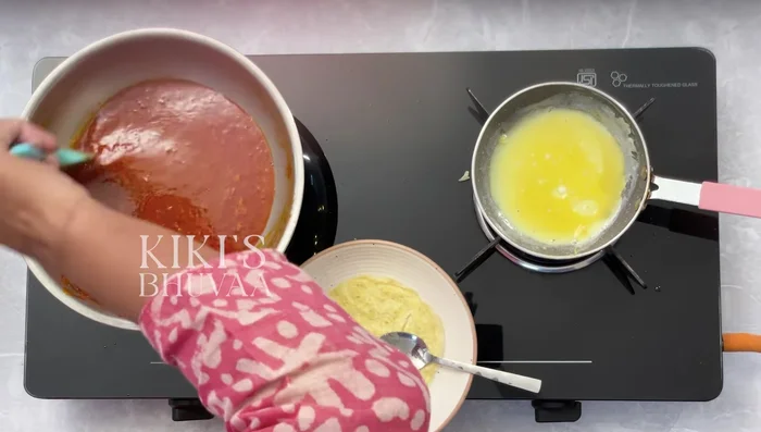 Combine cooked noodles with Schezwan sauce and serve with side dishes.