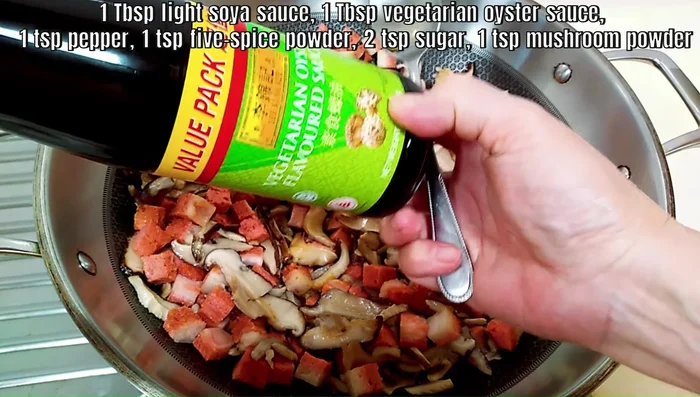 Add soya sauce, vegetarian oyster sauce, pepper, five-spice powder, sugar, and mushroom powder (optional) to the mushroom and meat mixture. Mix well.