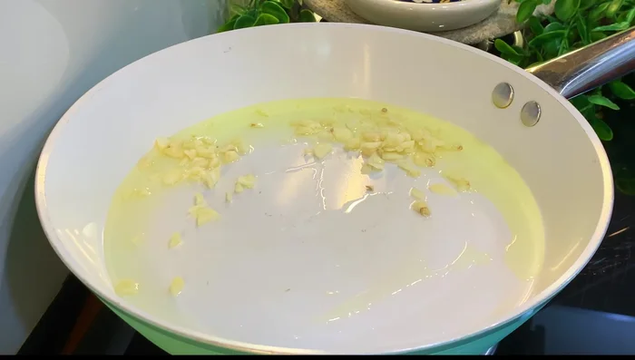 Add finely chopped garlic and fry for a few seconds.