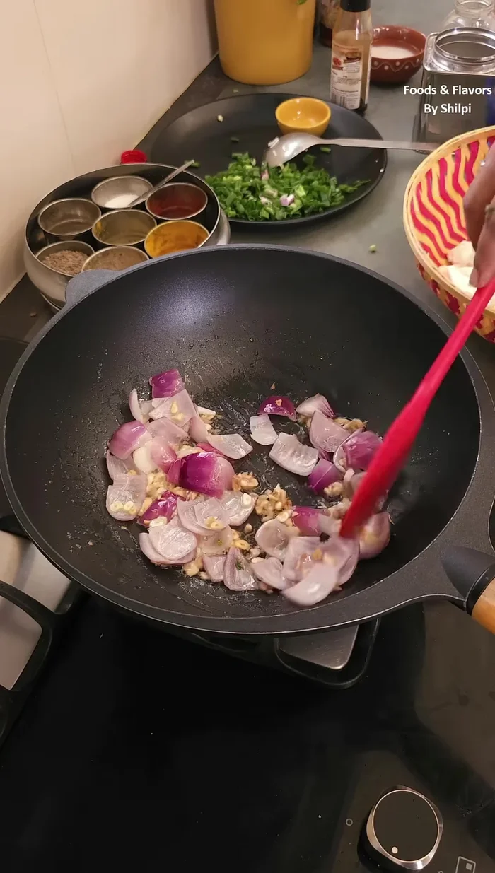 Add chopped onions and fry for 1 minute.