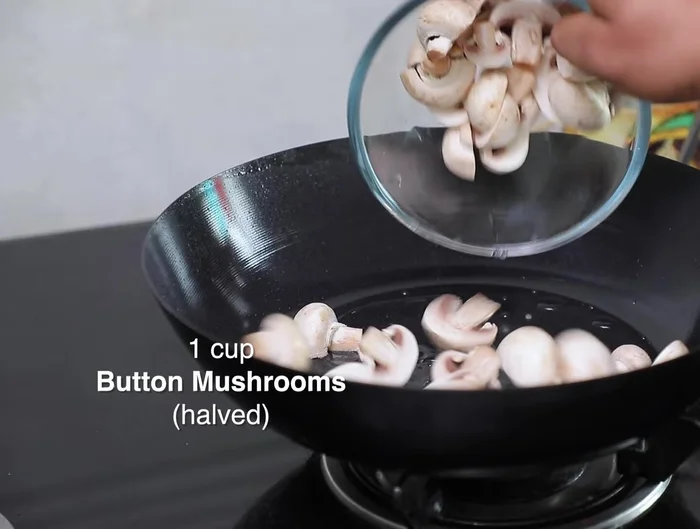 Add diced or sliced mushrooms and stir-fry.