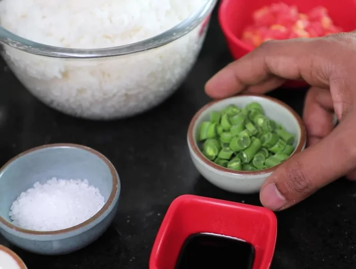 Add French beans and carrots. Stir-fry.