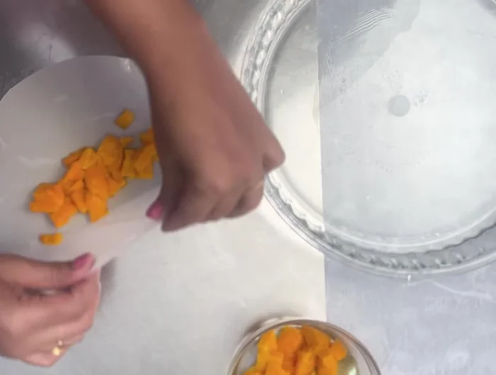 Fill each sheet with mango, fold, and fry until crispy.