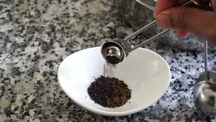 Prepare the five-spice blend (pachron): Combine cumin seeds, mustard seeds, nigella seeds, fennel seeds, and fenugreek seeds in a bowl.
