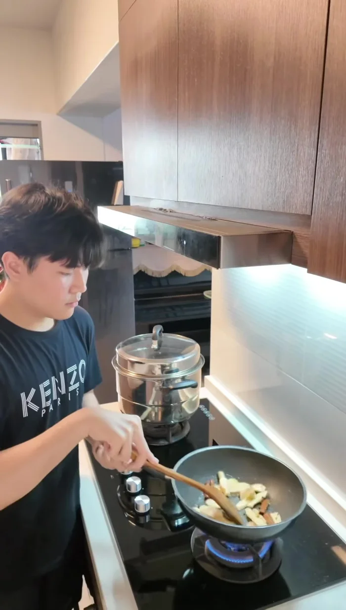 Add rock sugar and red (presumably red dates or other red ingredient).
