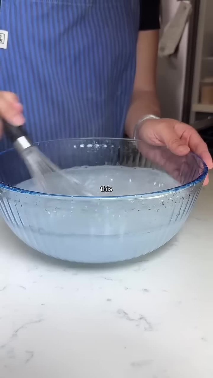 Mix one part table salt with four parts water. Use a whisk to dissolve the salt completely.