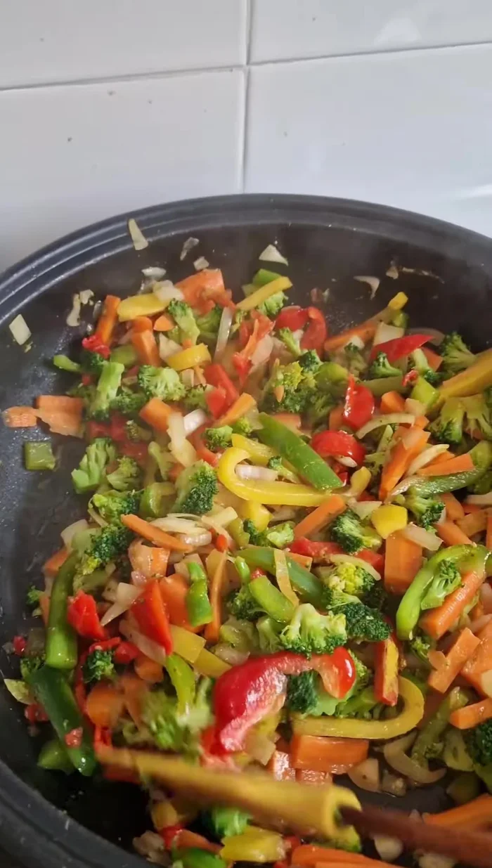 Add curry powder and water. Cook for some time.