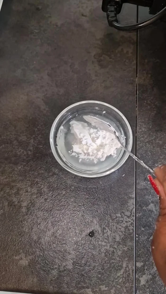 Mix cornstarch and water to create a slurry. Set aside.
