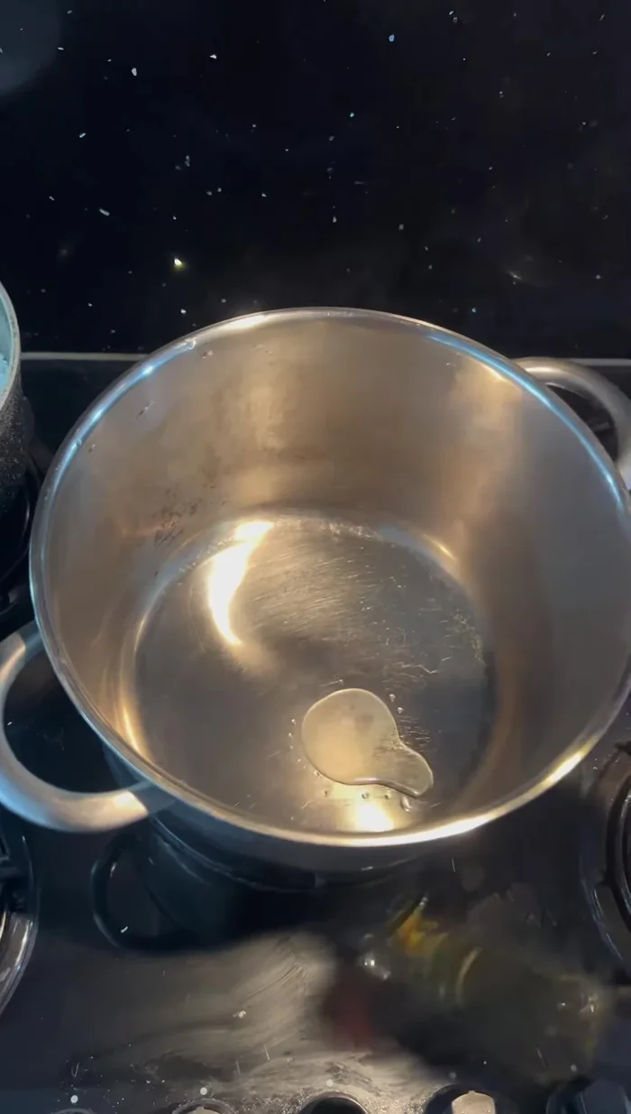 Heat oil in a pan, add spices and stir.