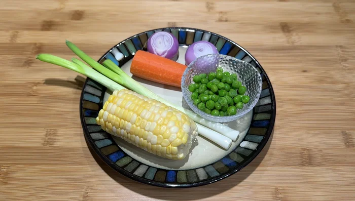 Prepare vegetables: Cut carrots into small cubes (about 1cm). Dice shallots into small pieces.