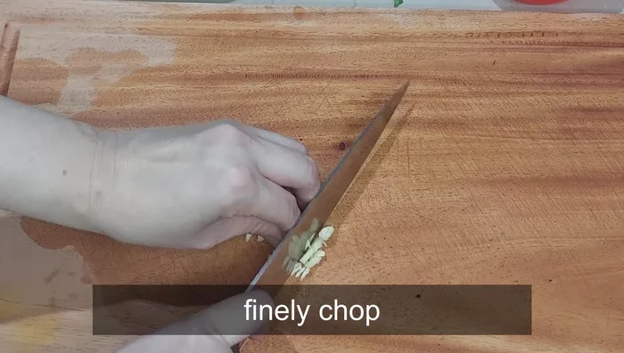 Finely chop the garlic.