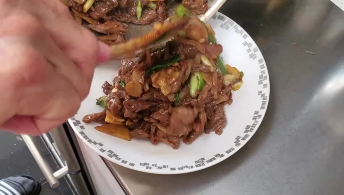 Finally, add sesame oil and serve.