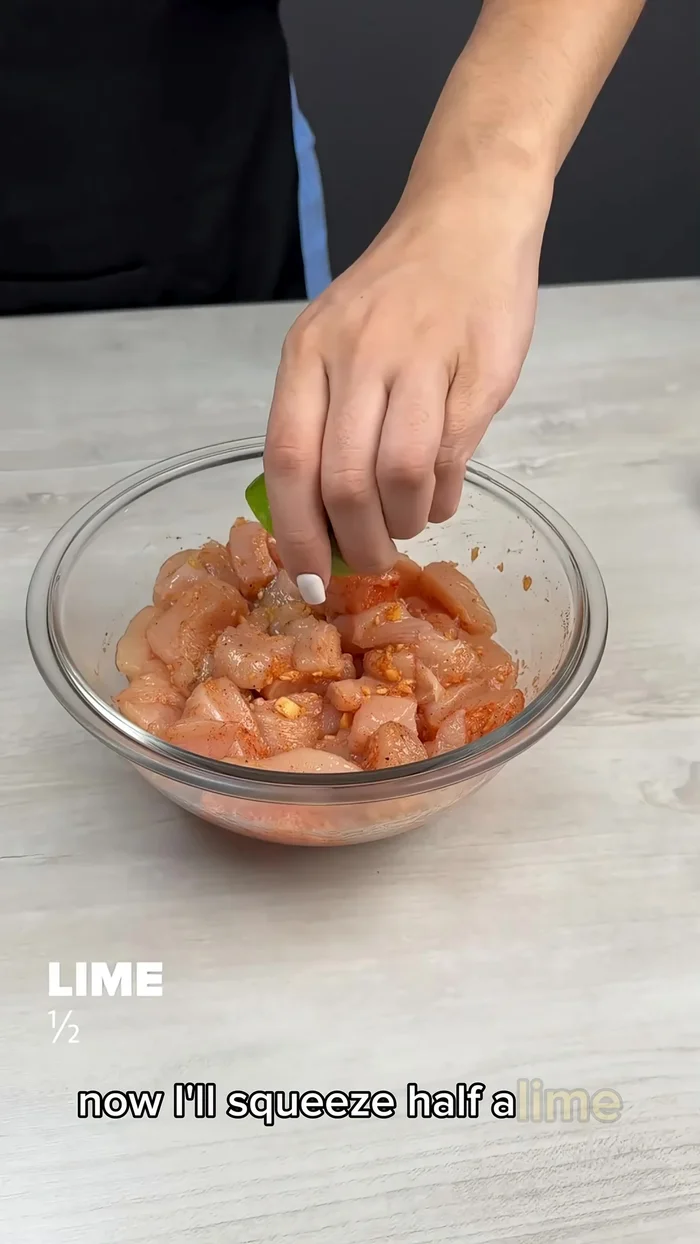Squeeze 1/2 lime over the chicken. Add 3 tablespoons cornstarch and mix well.