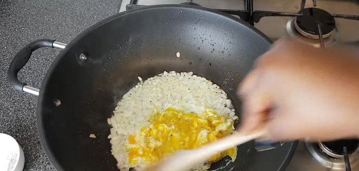 Mix the egg with the onion and garlic until no longer runny.