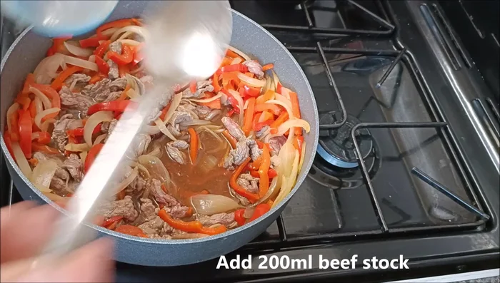 Add 200ml of beef stock and the black bean mixture. Mix and cook until the sauce has reduced and thickened.