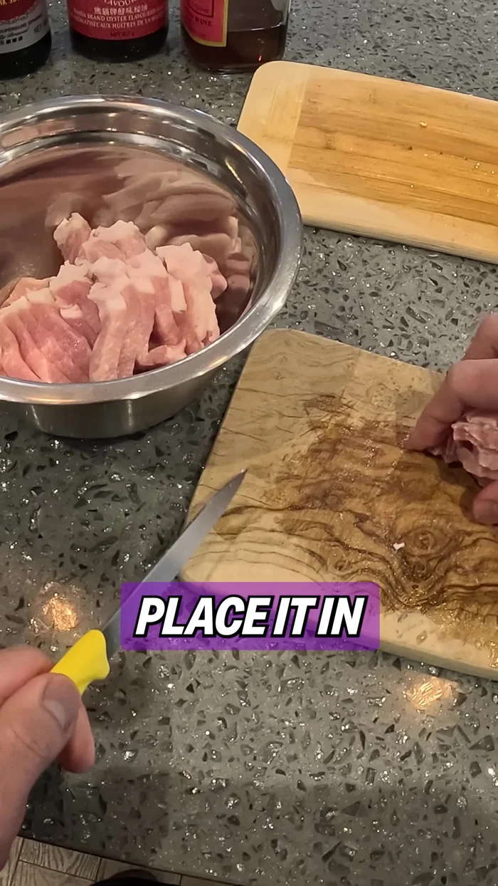 Place the pork in a mixing bowl. Prepare the pork marinade: Add 1 tsp baking soda, 1 tsp sugar, 1 tbsp cornstarch, pepper to taste, 1 tbsp Shaoxing cooking wine, 1 tbsp soy sauce, 1 tbsp oyster sauce, and 2 tbsp water. Mix well.