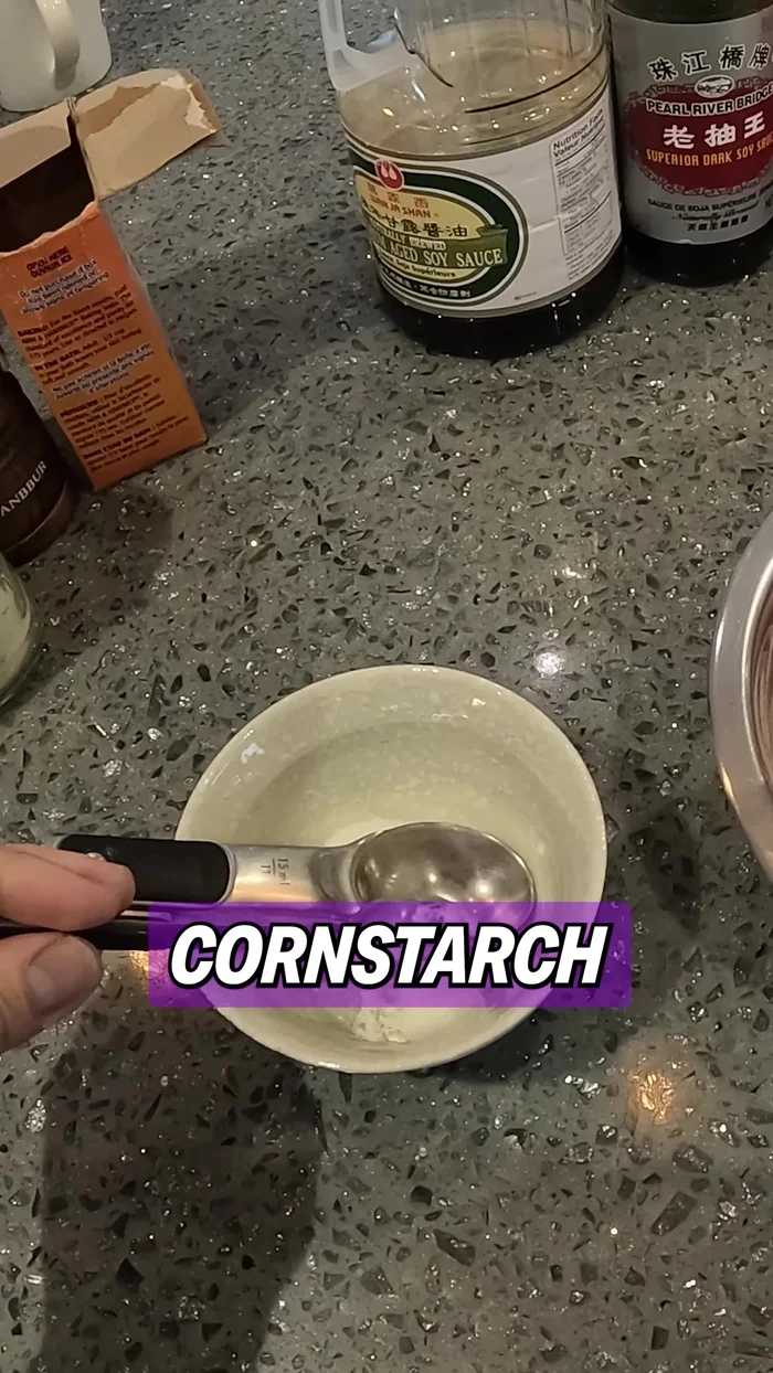 Prepare the sauce mixture in a separate bowl: Add 1 tsp sugar, 1 tsp cornstarch, pepper to taste, 1 tbsp Shaoxing cooking wine, 1 tbsp soy sauce, 1 tbsp oyster sauce, 1 tsp dark soy sauce, and 1 tbsp water. Mix well.
