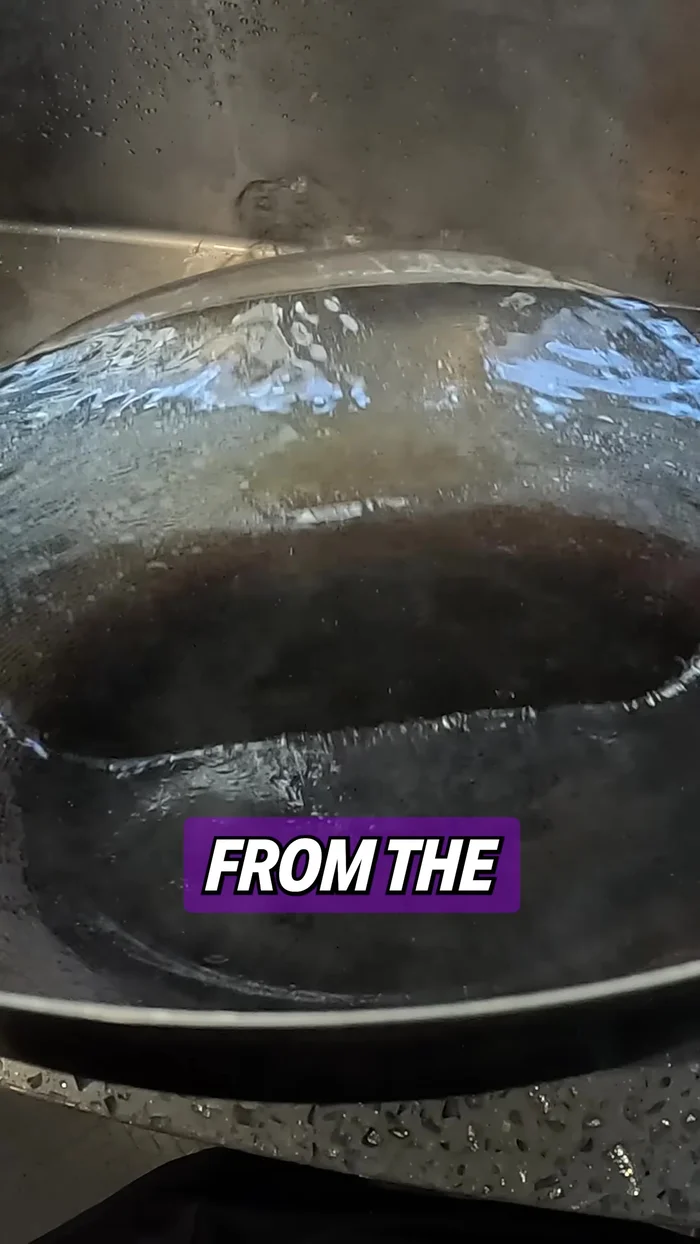 Drain the water from the wok. Add about a tablespoon or two of cooking oil. Add the pork marinade to the pork and mix.