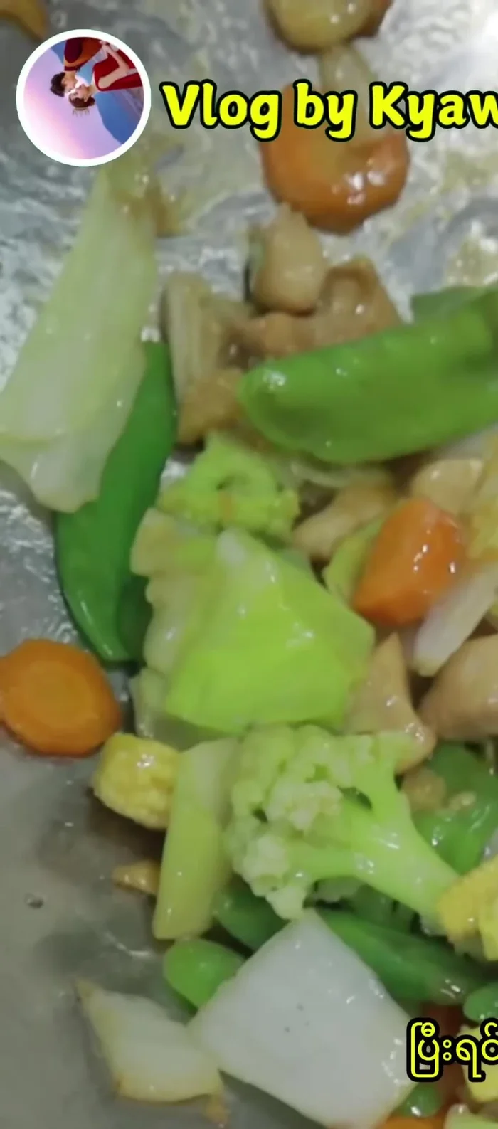 Combine and finish: Add the cooked blanched vegetables. Stir well, add the sauce, and cook for another two minutes. Serve over rice.