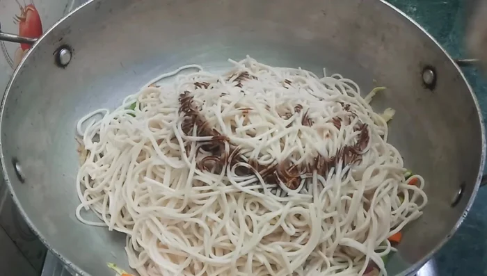 Add 1 tablespoon soy sauce, 3 tablespoons tomato sauce, 1 tablespoon red chili sauce, 5 teaspoons oregano, and 1 tablespoon white vinegar.