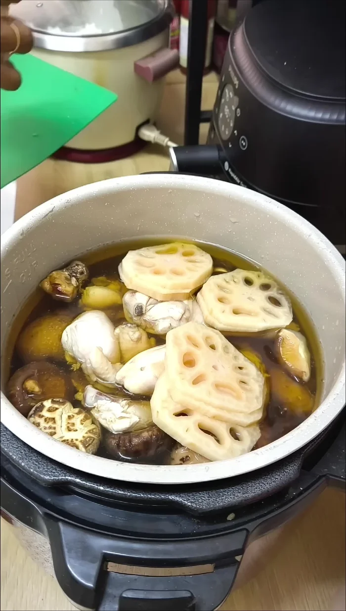 Add the whole clove of garlic and spices (optional).