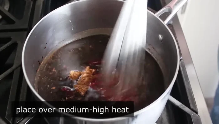 Bring the sauce to a boil over medium-high heat, whisking constantly. Boil for exactly 1 minute, then remove from heat and let cool to room temperature.