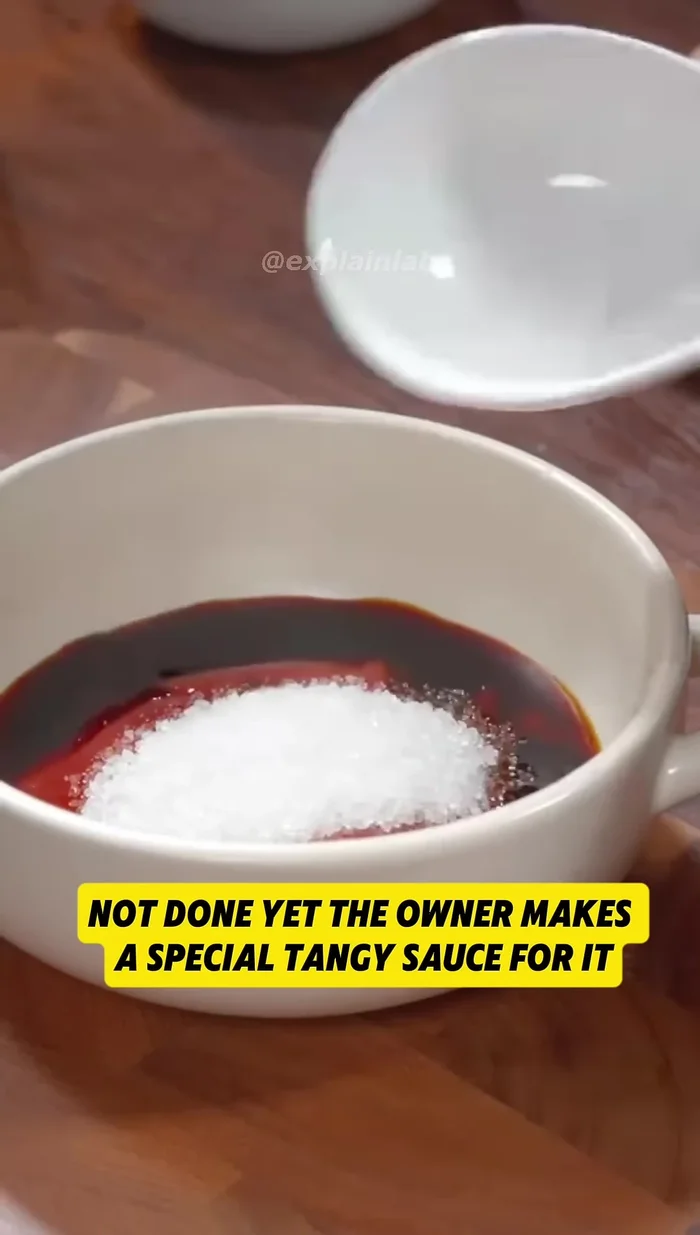 Prepare the sauce: Mix sugar, vinegar, soy sauce, water, and ketchup in a pan.