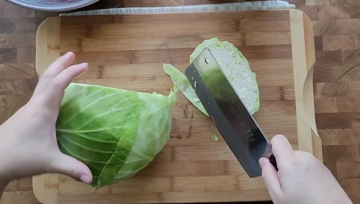 Thinly shred cabbage and one large carrot and sauté in a pan with cooking oil until softened. (457.16)