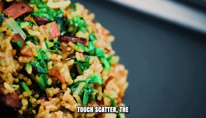 Scatter green scallion tops over the rice, toss once more, and turn off the heat.